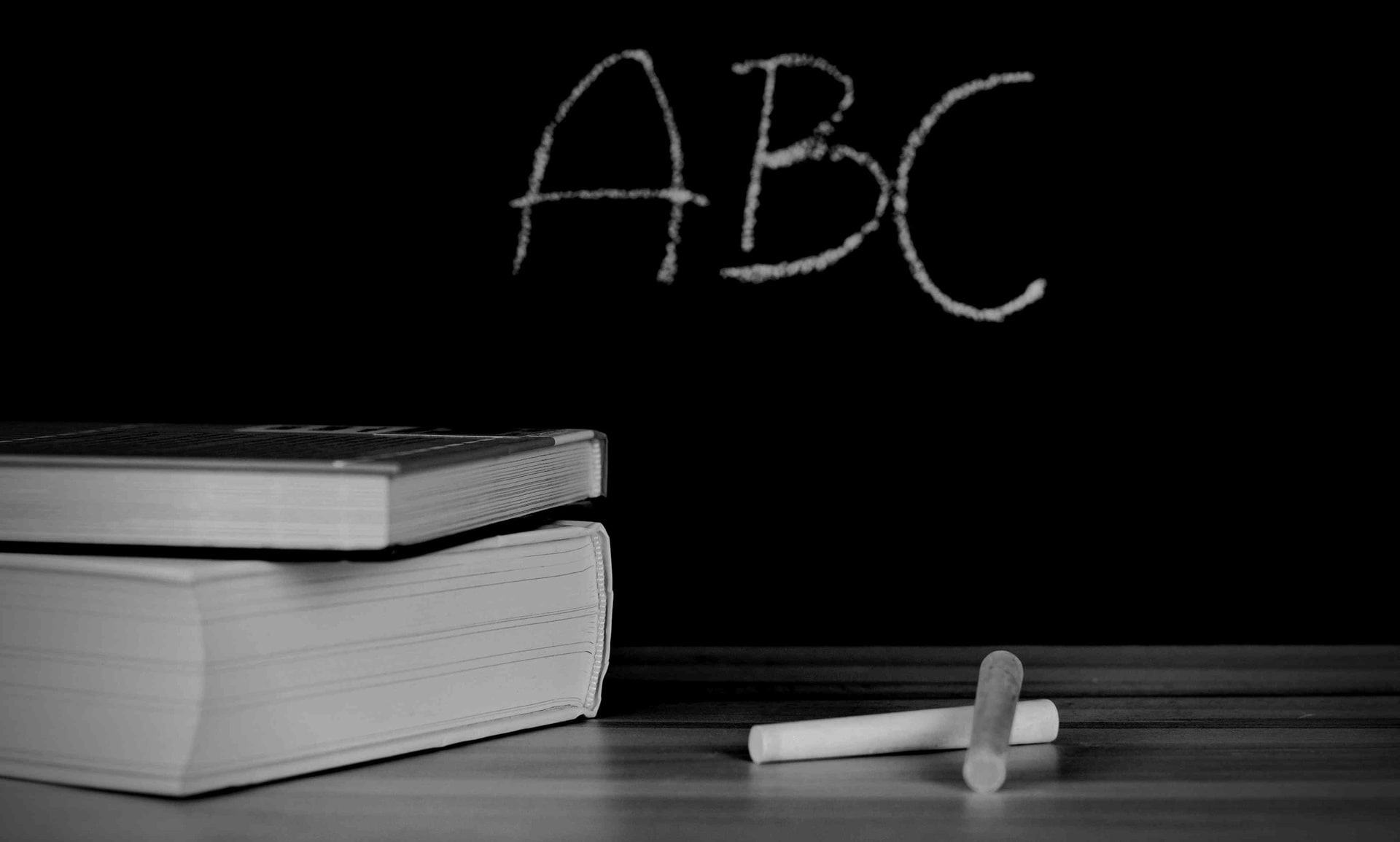 School blackboard ABC chalk desk books